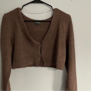 Im selling a cropped cardigan sweater. The brand is wild fable. Very soft